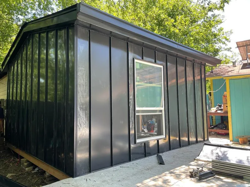 Black standing seam metal wall panels for Metal Roof Installation in Friendly