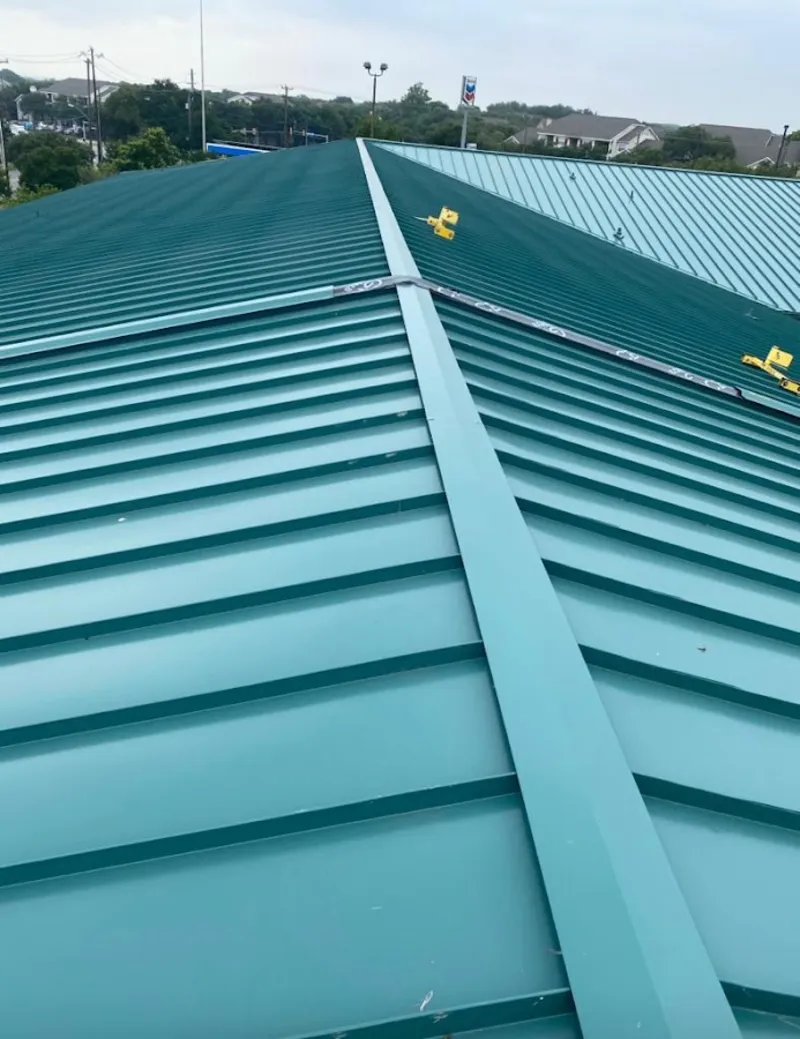 Green commercial metal roof ridge and valley for Metal Roof Repair in Friendly